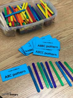 colorful matchsticks and labels on a table