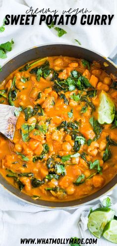 a pan filled with sweet potato curry and garnished with cilantro