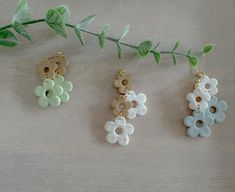 Our adorable white + neutral flower color block earrings are a great way to bring a subtle vibe to your outfits! Made in small batches, these earrings are not mass produced and give unique flair to being uniquely yours! <3  Approx. 1.5 in. length We use non-toxic metals (we have sensitive ears too!) and all metals are lead and nickel free. These posts are hypoallergenic 18k plated gold. Available in 10 different color combos. Floral Clay Earrings, White Flower Earrings, White Flower Earring, Summer Earrings, Summer Earring, Clay Flowers, Earrings White, Earrings Boho, Earrings Color