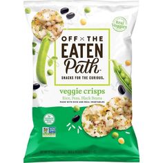 an open bag of green beans and other vegetables on a white background with the text off the eaten path snacks for the curious