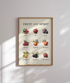 fruit of the spirit poster hanging on wall next to window with sunlight coming through it