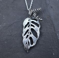 Monstera Adansonii Necklace - Recycled sterling silver and entirely handmade. I pressed a *real* leaf into this pendant to give it a beautiful realistic texture. #monstera #monsteraadansonii  #monsteramonday #houseplants #plantlady Silver Clay Jewelry, Monstera Adansonii, Flower Resin Jewelry, Real Leaf, French Wire Earrings, 3d Jewelry, Silver Clay, Striped Cat, Metal Clay Jewelry