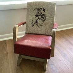 a chair with a drawing on the back of it