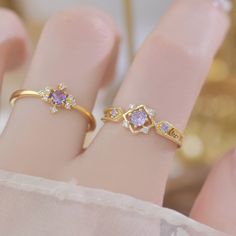 📌 Please Note: Items on this page are sold together. When adjusting the ring, please squeeze or expand the ring body slowly and gently. 💎 Materials: 14k Gold Electroplated - more durable than regular platings Cubic Zirconia 📐 Size: Adjustable Open Design - Size 5+ Gold Amethyst Open Ring For Promise, Gold Amethyst Open Promise Ring, Gold Amethyst Ring With Prong Setting For Promise, Gold Amethyst Open Ring For Gift, Gold Open Amethyst Ring For Gift, Gold Amethyst Ring With Cubic Zirconia For Promise, Adjustable Gold Birthstone Ring With Prong Setting, Open Design, Diamond Crystal