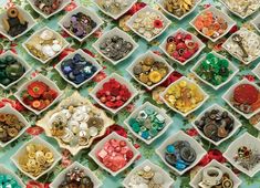 there are many different types of beads in the trays