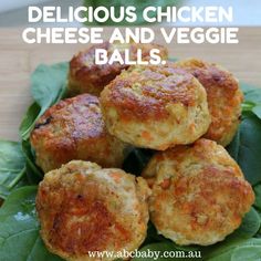 delicious chicken cheese and veggie balls recipe on a plate with spinach leaves