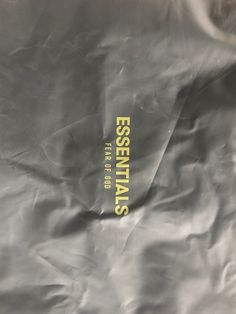 a bag with the words essentials printed on it