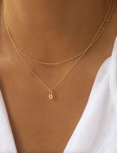 A little pendant with a whole lot of luck. This petite gold vermeil horseshoe pendant is topped with petite pave CZ’s, and can easily be added to your daily necklace stack. A little bit of lovely, and a little bit of luck all in one. Material CZ set in 14k gold vermeil 16" gold filled extra-fine cable chain Pendant measures 5mm Details Each piece of Leah Alexandra jewellery is handmade in her Vancouver beachside studio. Only the finest materials are used, including 14k gold fill, sterling silver Golf Necklace, Horseshoe Necklace Gold, Daily Necklace, Classy Necklace, Necklace Stack, Horseshoe Pendant, Horseshoe Necklace, Daily Jewelry, Wear Necklaces