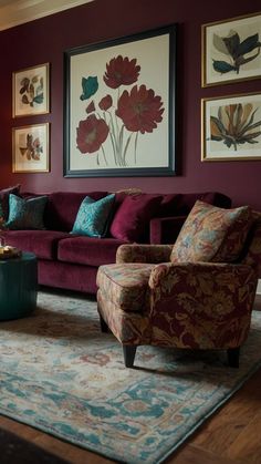 a living room filled with furniture and paintings on the wall