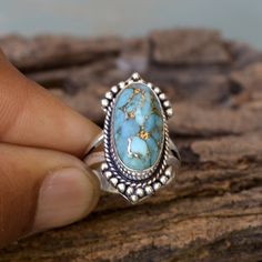 Blue Copper Turquoise Gemstone Ring - 925 Sterling Silver Ring - Designer Ring - Blue Turquoise Ring -Birthstone Gift Ring -Unique Gift Ring- AMZ-01 Turquoise is also known to promote leadership qualities. Not only does it help to induce wisdom and understanding but it opens the throat chakra allowing us to share that wisdom and understanding with others. Turquoise is a stone for finding, communicating and manifesting truth. It is said to open the throat chakra empowering us to articulate our wi Sterling Silver Turquoise Topaz Ring, Silver Turquoise Gemstone Ring For Anniversary, Southwestern Blue Rings For Anniversary, Southwestern Style Blue Round Ring, Adjustable Untreated Blue Turquoise Ring, Southwestern Blue Rings For Gift, Southwestern Blue Jewelry For Anniversary, Southwestern Style Blue Rings For Gift, Southwestern Style Blue Rings For Gifts