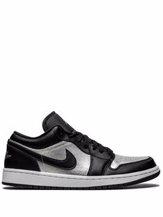 Black/silver-tone leather Air Jordan 1 Low SE sneakers from JORDAN featuring signature Air Jordan Wings logo, signature Jumpman motif, signature Swoosh logo detail, two-tone design, round toe, front lace-up fastening, branded insole and rubber sole. These styles are supplied by a premium sneaker marketplace. Stocking only the most sought-after footwear, they source and curate some of the most hard to find sneakers from around the world.. | Jordan Low SE sneakers Modern Silver Lace-up Custom Sneakers, Modern Metallic Sneakers With Rubber Sole, Casual Silver Custom Sneakers With Rubber Sole, Silver Low-top Sneakers With Contrast Sole, Silver Low-top Sneakers With Metallic Logo, Silver Leather Sneakers With Contrast Sole, Silver Sneakers With Metallic Logo For Streetwear, Silver Custom Sneakers With Rubber Sole For Streetwear, Custom Silver Sneakers With Rubber Sole For Streetwear