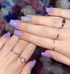 Purple Nails With Glitter Tips, Nails Inspiration Purple Short, Short Purple Acrylic Nails With Rhinestones, Multi Colored Purple Nails, Purple With Sparkle Nails, Simple Spring Nails Purple, Small Purple Nails, Solid Color Nails With One Glitter Nail, Gel Nails Purple Glitter