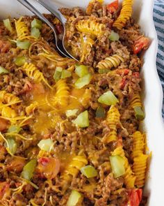 a casserole dish filled with ground beef and pasta