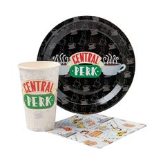 a black and white dinnerware set with the words central perk printed on it