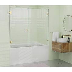 a bathroom with a sink, mirror and bathtub next to a wall mounted faucet