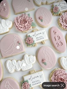 wedding cookies decorated with pink and white icing