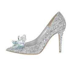 a pair of silver high heels with a bow on the toe and glittered upper part