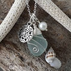 Handmade in Hawaii, Wire wrapped Genuine Hawaii surf tumbled sea glass necklace. sand dollar charm, Fresh water pearl, Beach jewelry. by yinahawaii on Etsy Beach Jewelry With Hand Wrapped Sea Glass, Hand-wrapped Sea Glass Jewelry For The Beach, Hand Wrapped Sea Glass Jewelry For The Beach, Ocean-inspired Wire Wrapped Jewelry For Beach, Pearl Beach, Hawaii Surf, Hawaiian Jewelry, Beachglass Jewelry, Beach Bracelets