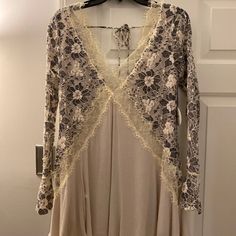 Nwt Never Been Worn Tularosa Dress. Purchased From Revolve In 2016. Black And Cream Mini With Mesh Sleeves. Fall Cream Dress With Lace Trim, Cream Lace Trim Dress For Fall, Fall Beige Lace Mini Dress, Beige Lace Mini Dress For Fall, Cream Flowy Lace Mini Dress, White Bohemian Dress For Night Out, Spring Cream Mini Dress With Lace Patchwork, Cream Lace Dress For Fall, Beige Lace Trim Dress For Night Out