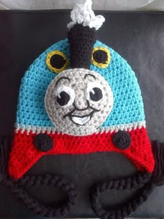 a crocheted thomas the tank engine hat