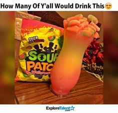 a candy filled drink next to a bag of soury patties