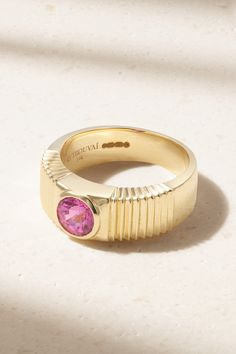 Founder Kirsty Stone describes Retrouvaí's fine jewelry as "a dose of fun that still maintains an heirloom-quality — that helps a woman tell her unique story." Handmade from 14-karat gold, this one-of-a-kind ring is set with a shimmering pink sapphire and has a wide band etched with a pleated effect. Wear yours solo or stacked with dainty styles. Luxury Pink Sapphire Rings With Gemstone, Luxury Pink Sapphire Ring For Formal Occasions, Modern Yellow Gold Sapphire Ring For Formal Occasions, Modern Yellow Gold Sapphire Ring For Formal Events, Formal Pink Rings With Polished Finish, 14k Gold Art Deco Jewelry, Luxury Baguette-cut Ruby Ring In Yellow Gold, Art Deco Yellow Gold Ruby Ring For Formal Events, Art Deco Sapphire Ring With Polished Finish