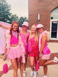 three girls dressed in pink posing for the camera with their arms around each other while wearing matching outfits