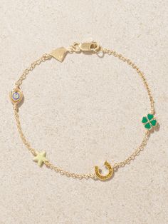 Alison Lou's 'Lucky by the Yard' bracelet features a handful of talismans - like an evil eye, clover and horseshoe - that are thought to bring you good fortune. It's handmade from 14-karat gold and inlaid with colorful enamel, glitter and a shimmering diamond. Symbolic Yellow Gold Bracelets With Charms, Symbolic Yellow Gold Bracelet With Charms, Yellow Gold Charms Bracelet For Good Luck, Yellow Gold Good Luck Charms Bracelets, Latest Bracelets, Alison Lou, Diamond Evil Eye, Lucky Bracelet, Enamel Bracelet