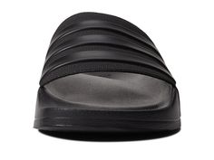 Get yourself the trendy adidas® Adilette Shower slippers..Synthetic upper, lining and insole..adidas® logo on toe strap..Slip-on closure..Synthetic outsole..Imported..Product measurements were taken using size Men's 10, Women's 11, width Medium. Please note that measurements may vary by size..Measurements: Weight: 4 oz Comfortable Adidas Slides With Synthetic Material, Adidas Synthetic Slides For Swimming, Adidas Slides For Swimming With Synthetic Material, Adidas Slides For Swimming With Logo, Adidas Logo Synthetic Slides For Swimming, Sporty Adidas Slides Suitable For Water, Adidas Slides With Logo For Swimming, Sporty Adidas Slides For Swimming, Adidas Sporty Slides For Training