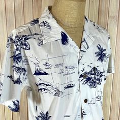 "Aloha Shirt, White with Hawaiian Designs. Made by Palmwave. 100% Cotton with Coconut Buttons. One breast pocket that matches the shirt design. Size is Men's Medium.  Chest: 23\" Waist: 21\" Shoulders: 19\" Length: 28\" Sleeve Opening: 8\" Measurements are taken with the shirt lying flat. Please measure your favorite shirt for fit, see 'About IslandStyleAlohaWear' for my detailed return policy.  Short sleeve, button down casual shirt.  This is a great shirt in great condition. I hand pick every shirt for my shop and only choose shirts that are in the best possible condition for their age. I will note any condition issues if applicable.  There are no holes, tears, rips or stains.  Remember, this is pre-worn but has been very gently or minimally used, well stored and is in good condition. On White Short Sleeve Beach Shirt With Pockets, White Short Sleeve Shirt With Pockets For Beach, White Cotton Hawaiian Shirt With Camp Collar, White Hawaiian Camp Shirt In Cotton, Cotton Hawaiian Shirt With Pockets For Vacation, White Vintage Shirt For Vacation, Vintage White Shirt For Vacation, Hawaiian Designs, Blue Hawaiian