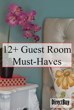 a chair with pillows and flowers on it in front of a blue wall that says, 12 + guest room must - haves