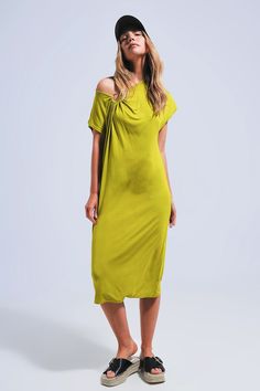 Ring midi dress in lime Szua Store Flowy Draped Midi Dress For Spring, Green Draped Spring Dress, Spring Green Draped Dress, Green Spring Maxi Dress With Asymmetrical Neckline, Chic Draped Viscose Midi Dress, Spring Green Maxi Dress With Asymmetrical Neckline, Chic Draped Midi Dress In Viscose, Spring Green Viscose Midi Dress, Green Flowy Knee-length Midi Dress