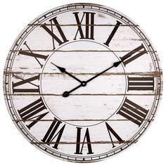 a large clock with roman numerals on the face