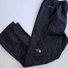 The Relaxed-Fit Men’s Hyvent Rain Pants Feature Dryvent Fabric For Waterproof, Breathable Protection Whenever The Weather Takes A Turn. An Adjustable Waist And Articulated Knees Allow For Better Mobility And Comfort While Exploring. The North Face Pants, North Face Pants, Rain Pants, Fit Men, Face Men, Black North Face, North Face Mens, Mens Fitness, North Face