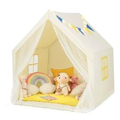 a toy tent with stuffed animals in it