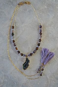 A boho wrap necklace stunner with a sparkly occo agate geode and lots of crystals in the center. The gemstones in the wrap necklace are natural faceted Peitersite in rich tones of brown, copper and caramel paired with Lepidolite in cool shades of dusty lavender. The lavender Lepidolite brings out the the subtle purple undertones in the Peitersite creating a unique statement for your boho chic look. This wrap necklace is a faux wrap, meaning it does have a clasp in the back to keep the necklace i Handmade Bohemian Agate Geodes, Bohemian Geodes For Healing With Natural Stones, Bohemian Natural Stone Geodes For Healing, Bohemian Geodes For Healing, Bohemian Hand Knotted Agate Jewelry, Bohemian Hand-knotted Agate Jewelry, Bohemian Agate Geodes, Bohemian Agate Necklace With Gemstone Accents, Geode Necklace