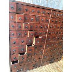 an old wooden dresser with many drawers