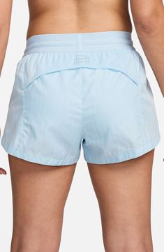 Gear up for your run with these lightweight mid-rise shorts constructed from water-repellent fabric and designed with a brief liner for extra support. 3" inseam; 26" l;eg opening; 11 1/2" front rise; 15" back rise (size Medium) Elastic/drawstring waist Water-repellent Reflective details enhance visibility in low light or at night Lined 100% polyester Machine wash, tumble dry Imported Functional Bottoms With Built-in Shorts For Marathon, Nike Breathable Nylon Bottoms, Nike Moisture-wicking Nylon Shorts, Nike Athletic Nylon Shorts With Elastic Waistband, Functional Stretch Bottoms For Marathon, Functional Marathon Bottoms With Built-in Shorts, Nike Nylon Athletic Shorts With Built-in Shorts, Nike Functional Nylon Athletic Shorts, Nike Breathable Nylon Shorts