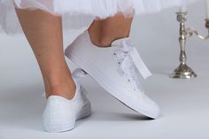 Now all our wedding sneakers with free express shipping upgrade to USA, Canada and Europe : 2-4 business days transit time always.You can have your shoes pretty fast with guranteed transit times by DHL express. New faster production time.Everything is shipped in 1-2 weeks. Made with love for your wedding day by Lovin Bridal - More Wedding shoes at our shop : http://lovincollection.etsy.com Different shoelace colors available - White/Silver , Gold, Rose Gold White Sequin Converse Sneakers, White Sequin Shoes For Bride, Sequin Sneakers, Sequin Trainers It's the bride's prerogative to wear the comfiest wedding shoes. If you're set on heels then one option is to have your Gold Sequin Converse as a second pair of bridal shoes to change into for the reception. There are so many options for your White Glitter Shoes, Cinderella Wedding Shoes, Wedding Sneakers For Bride, Glitter Tennis Shoes, Sequin Converse, Bride Converse, Comfy Wedding Shoes, Sequin Sneakers, Bridal Converse