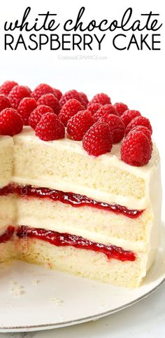 a white chocolate raspberry cake on a plate