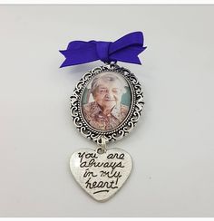 Our beautiful memory brooches allow everyone to have a loved one close to them for any special occasion.  The have most commonly been bought for grooms on their wedding day, allowing them to have a lost family member or friend with them on their special day.  Made with a pin attachment, they are easy to attach to any item of clothing or material.  Item listing is for One singular charm - number of photos selected is per charm - E.g. Two photos = one charm with two pictures linked.  The heart cha Personalized Silver Pins For Anniversary, Silver Brooches For Anniversary On Valentine's Day, Vintage Wedding Brooches For Valentine's Day, Heart-shaped Wedding Brooches For Valentine's Day, Personalized Silver Brooches For Anniversary, Vintage Heart-shaped Wedding Brooches, Personalized Elegant Wedding Brooches, Elegant Personalized Wedding Brooches, Elegant Wedding Pins For Valentine's Day