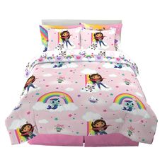 a child's bed with pink sheets and rainbows on the covers, including a cartoon character