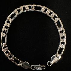 925 Plating Flat Figaro Chain Bracelet Constructed In Polished Offers Sleek, Elegant Style. Brand New 8.4” Total Length 8.2 Mm Width Lobster Clasp Closure 56-6 Sterling Silver Flower Bracelet, Silver Flower Bracelet, Fun Bracelet, Floral Bracelet, Energy Bracelets, White Gold Chains, Moonstone Bracelet, Figaro Chains, Mesh Bracelet