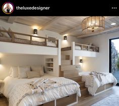 two beds in a room with wooden floors and white walls, one is made up as a loft bed