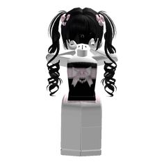 a black and white doll with long hair wearing a pink bow around her neck, standing in front of a white background