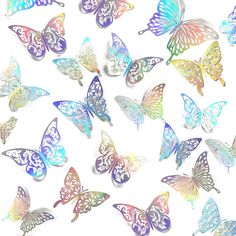 many different colored butterflies on a white background