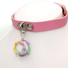 Details:- choker adjustable 12-15" length (1/2" wide) -Pink Vegan leather-Choker closes with snap buttons-beautifully detailed pastel rainbow birthday cake-round cake frosted with vanilla buttercream and piped rainbow buttercream edges & lacy frosting decoration around the middle and topped with classic rainbow confetti sprinkles. -Glossy finish, durable-cake is 1.20" wide by 1/2" tallWant this on a chain? It's available in my shop! http://etsy.com/shop/fatallyfeminine**Made to Order- Please Pink Adjustable Choker For Party, Adjustable Pink Choker For Party, Adjustable Pink Choker For Festivals, Adjustable Rave Choker For Gift, Adjustable Rave Choker For Gifts, Adjustable Rave Choker As Gift, Adjustable Pink Trendy Choker, Pink Trendy Adjustable Choker, Pink Adjustable Trendy Choker