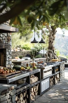 an outdoor kitchen with lots of food on it