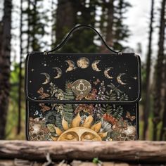 "Cottagecore Mystical Sun Canvas Satchel bag, Cute women moon phases crossed body purse, black strap hand bag, hippies boho Valentine's gift >>PRODUCT INFO<< Type: Waterproof Canvas, 10.8\"(L) x 4.13\"(W) x 7.87\"(H) 18.94 Oz. Made from high-grade waterproof canvas, durable, water-resistant. Can be used as a nice laptop iPad storage bag, business briefcase, college school bag, leisure travel tote bag, crossbody messenger bag, card wallet case, etc. Two interior pockets for small items one zipper Vintage Black Shoulder Bag For Festival, Black Bohemian Rectangular Satchel, Black Bohemian Shoulder Bag Gift, Boho Valentines, Ipad Storage, Boho Valentine, School Bag College, Canvas Satchel, Business Briefcase