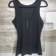 Flattering ribbed-knit tank with snap button front. Scooped neckline and fitted at true to size. I had these made with a thicker fabric so they are awesome quality!! Scooped Neckline, Knit Tank, Beach Babe, Knit Tanks, Knitting Designs, Scoop Neckline, Snap Button, Get Ready, In Style